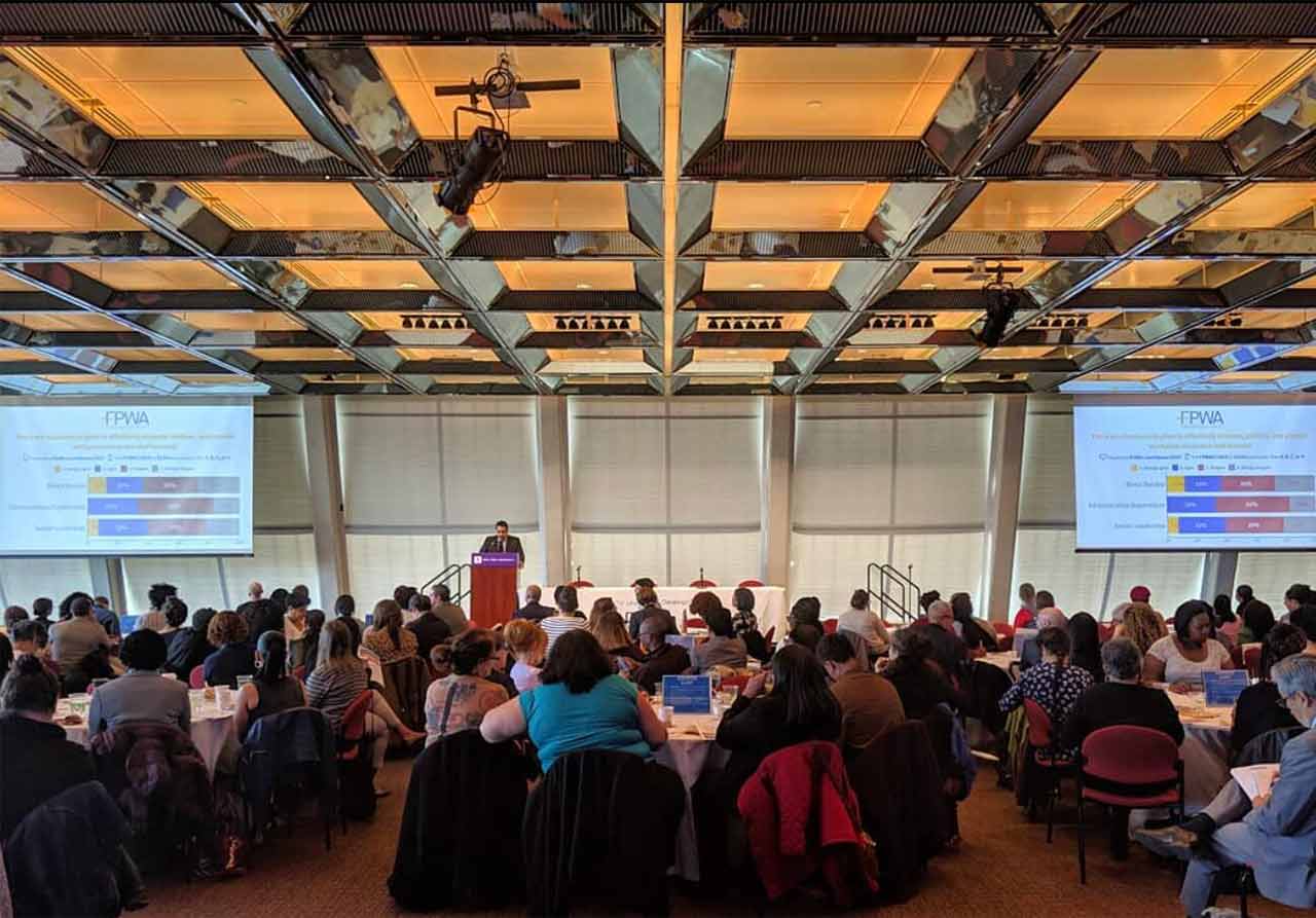 wide photo of speaker at an FPWA conference