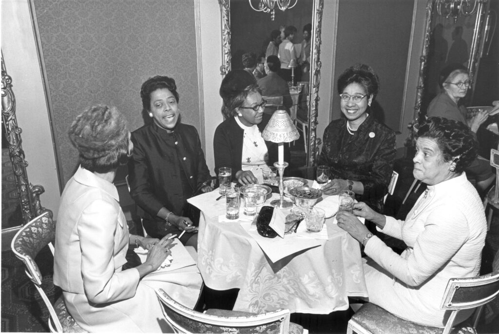 vintage women of color eating together